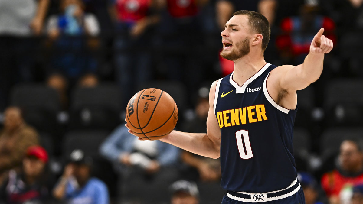 Denver Nuggets forward Christian Braun (0) looks to pass the ball against the Los Angeles Clippers during the third quarter at Intuit Dome.