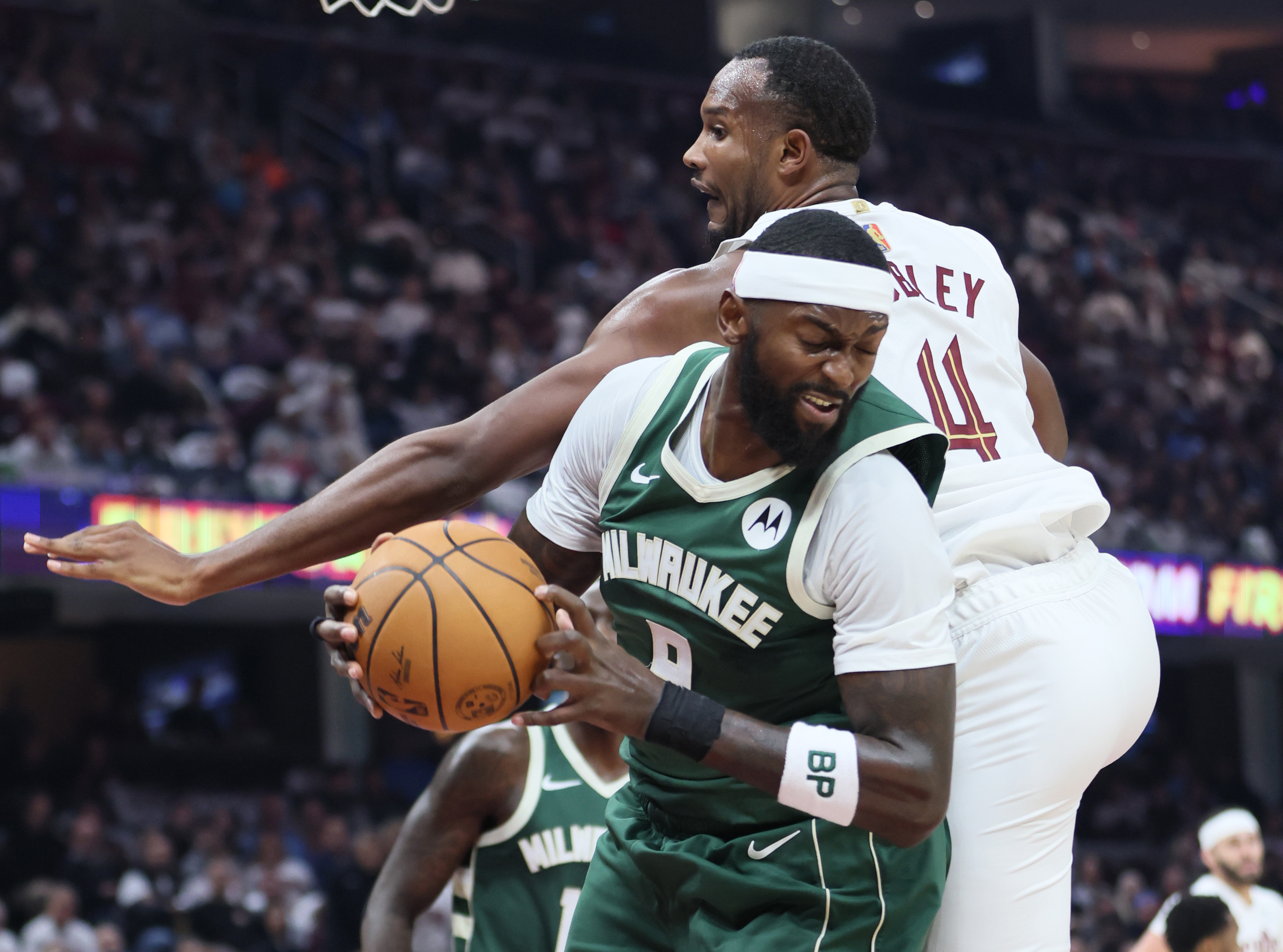 Milwaukee Bucks forward Bobby Portis secures a rebound from Cleveland Cavaliers center Evan Mobley in the first half at Rocket Arena. 