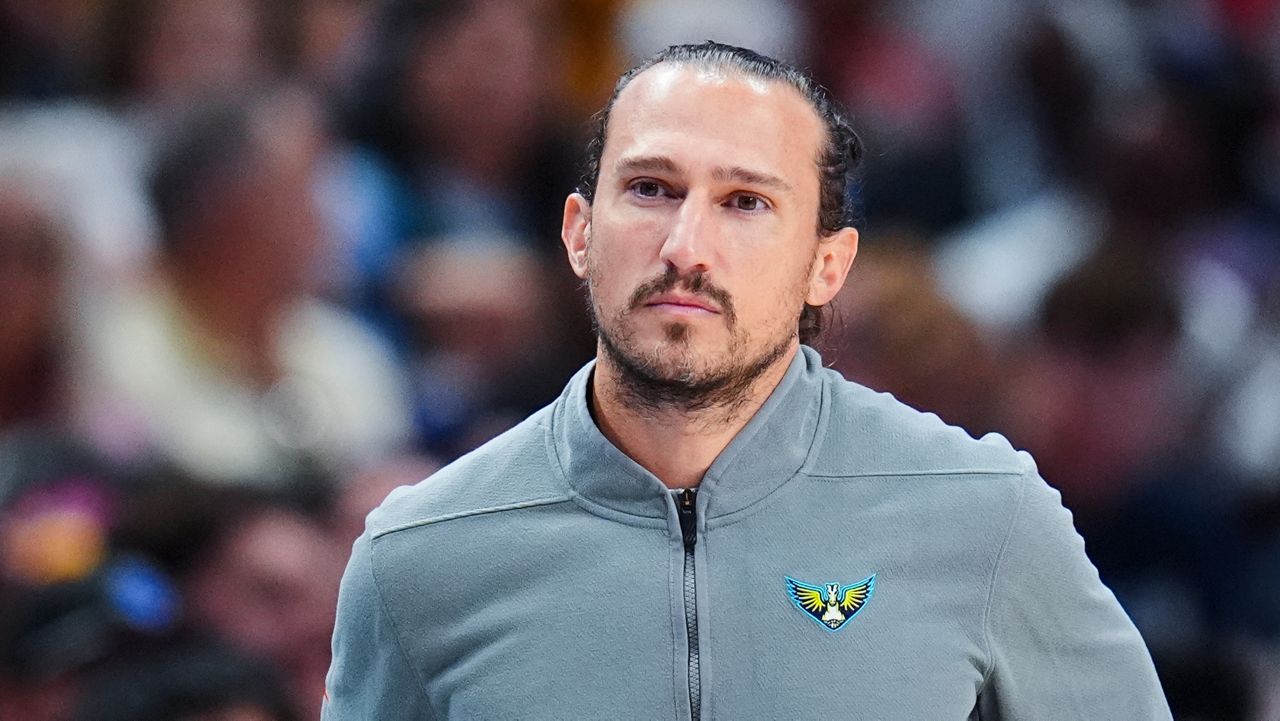 Dallas Wings head coach Chris Koclanes looks on during the first half of a WNBA basketball game against the Indiana Fever, Friday, Aug. 1, 2025, in Dallas. (AP Photo/Julio Cortez, FIle)