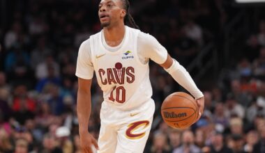 Cavaliers guard Darius Garland dribbles against the Suns during the first half at Footprint Center