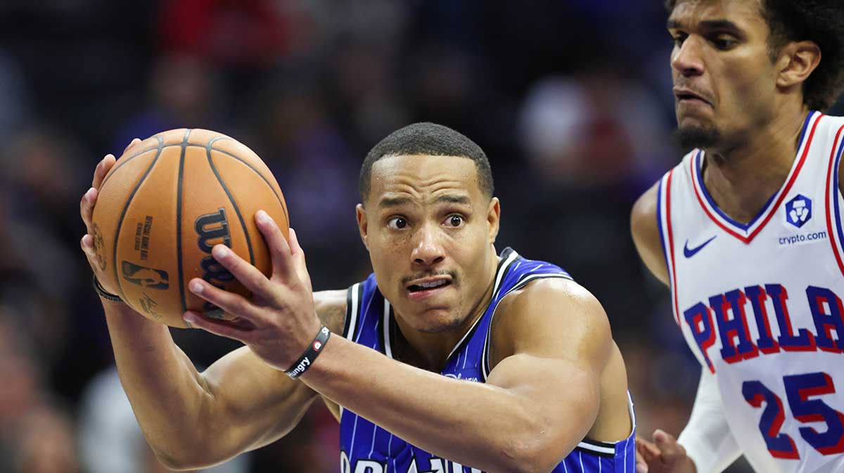 Orlando Magic guard Desmond Bane (3) drives past Philadelphia 76ers forward Dominick Barlow (25) during the third quarter at Xfinity Mobile Arena.