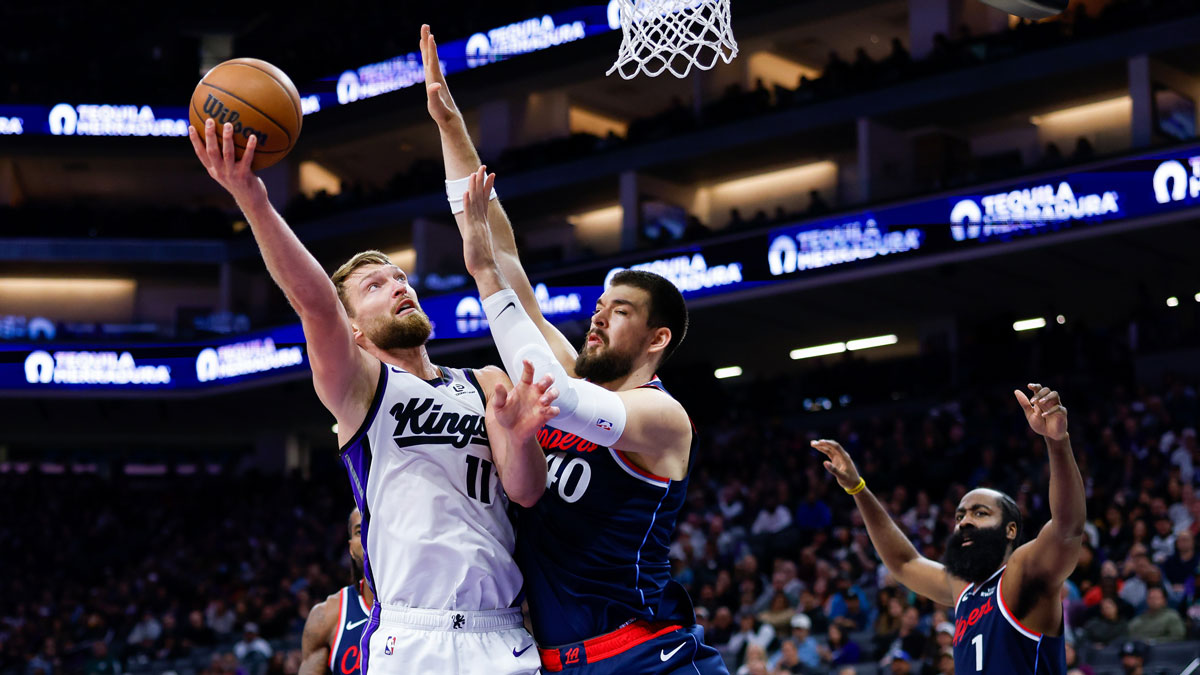 Sacramento Kings center Domantas Sabonis (11) is fouled by Los Angeles Clippers center Ivica Zubac (40) during the second quarter at Golden 1 Center.