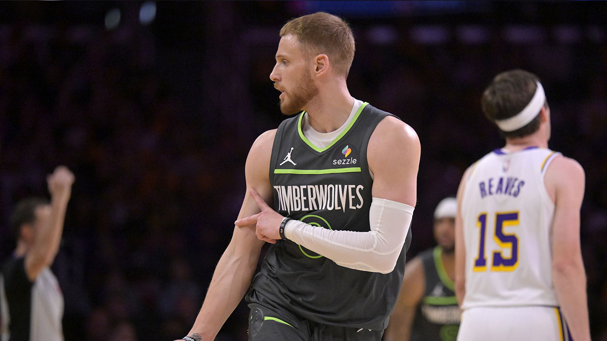 Apr 19, 2025; Los Angeles, California, USA; Minnesota Timberwolves guard Donte DiVincenzo (0) celebrates after a 3-point basket in the first half against the Los Angeles Lakers at Crypto.com Arena. Mandatory Credit: Jayne Kamin-Oncea-Imagn Images
