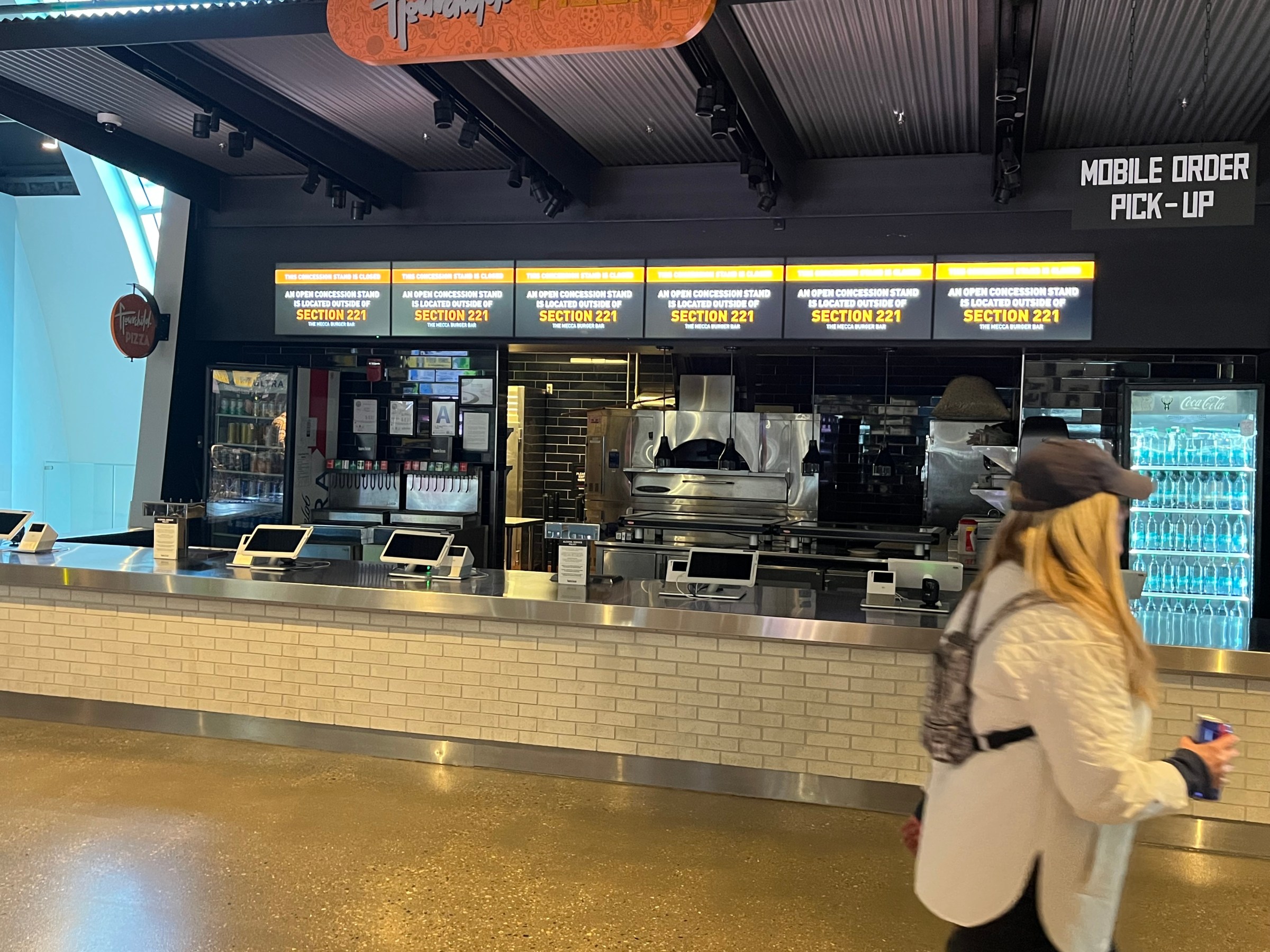 A closed Flourchild Pizza concession stand at Fiserv Forum.