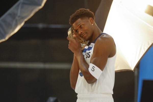 Minnesota Timberwolves guard Anthony Edwards (5) poses for a photograph as part of media day at Target Center.