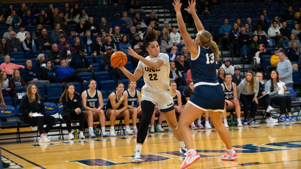 Northern Colorado women's basketball player Aniah Hall looks for a play in front of Concordia's (Nebraska) Abby Heemstra during the Bears' 2024-25 season-opening game Monday, Nov. 4, 2024 at Bank of Colorado Arena in Greeley. Hall, a 6-foot-3 forward from Texas, scored 13 points in 25 minutes off the bench. She was an All-Big Sky Conference honorable mention selection last season. (Kassidy Schwartz/UNC Athletics)