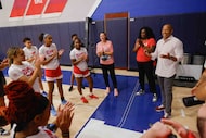Southern Methodist University’s athletic director Damon Evans (right) visits with the SMU...