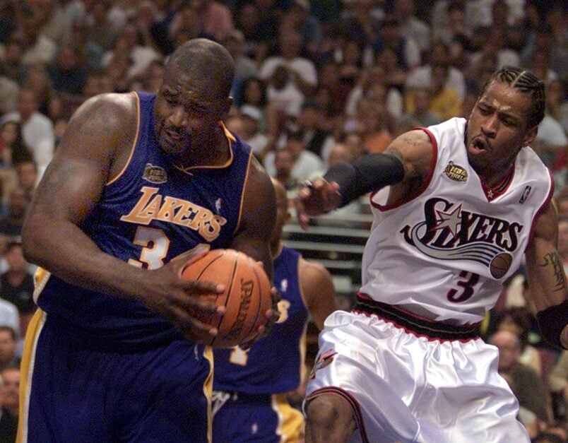 Los Angeles Lakers center Shaquille O'Neal (L) pulls the ball away from Philadelphia 76ers guard Allen Iverson (R) during the second quarter of game four of the NBA Finals.