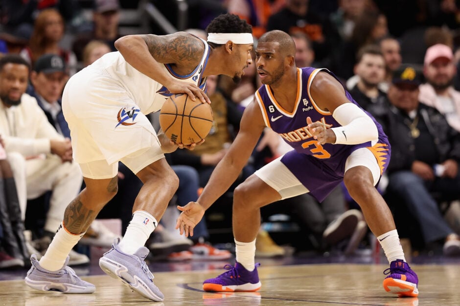 Bradley Beal #3 of the Washington Wizards handles the ball against Chris Paul #3 of the Phoenix Suns