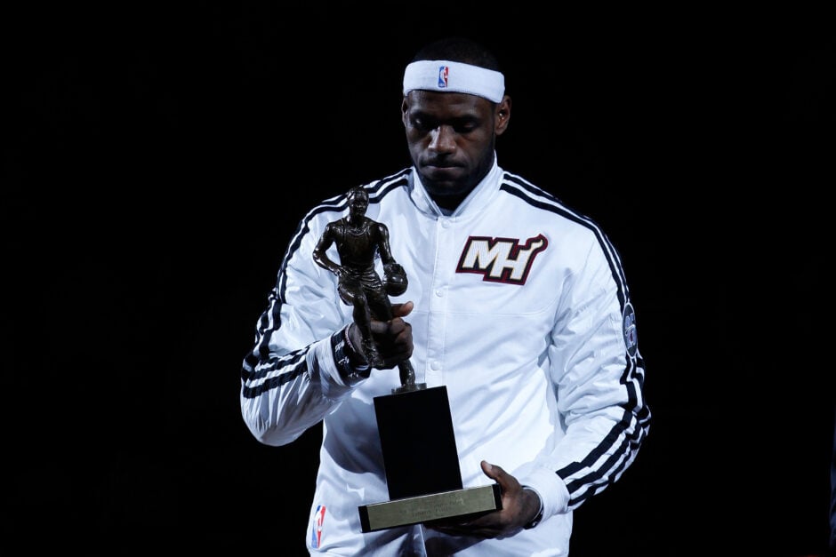 LeBron James #6 of the Miami Heat poses with the 2013 NBA MVP trophy prior to Game One against the Chicago Bulls in the Eastern Conference Semifinals of the 2013 NBA Playoffs at American Airlines Arena.