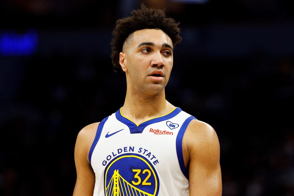 Trayce Jackson-Davis #32 of the Golden State Warriors looks on against the Minnesota Timberwolves in the second quarter at Target Center.