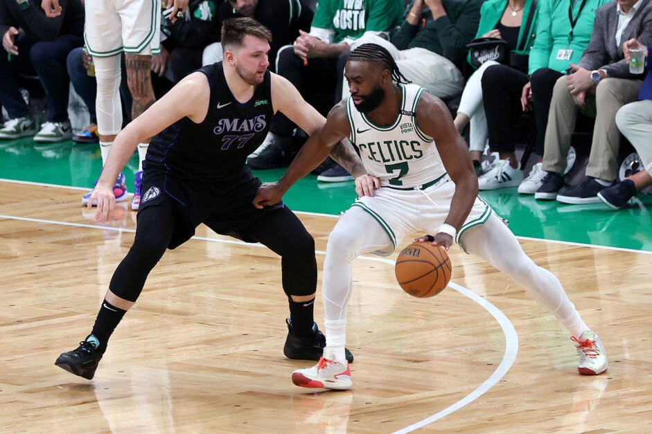 Jaylen Brown #7 of the Boston Celtics drives to the basket against Luka Doncic #77 of the Dallas Mavericks during the third quarter in Game One of the 2024 NBA Finals at TD Garden on June 06, 2024 in Boston, Massachusetts.