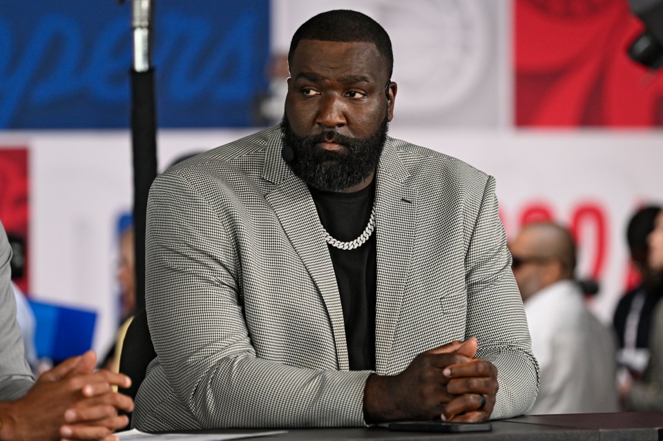 Kendrick Perkins sits at a ESPN studio