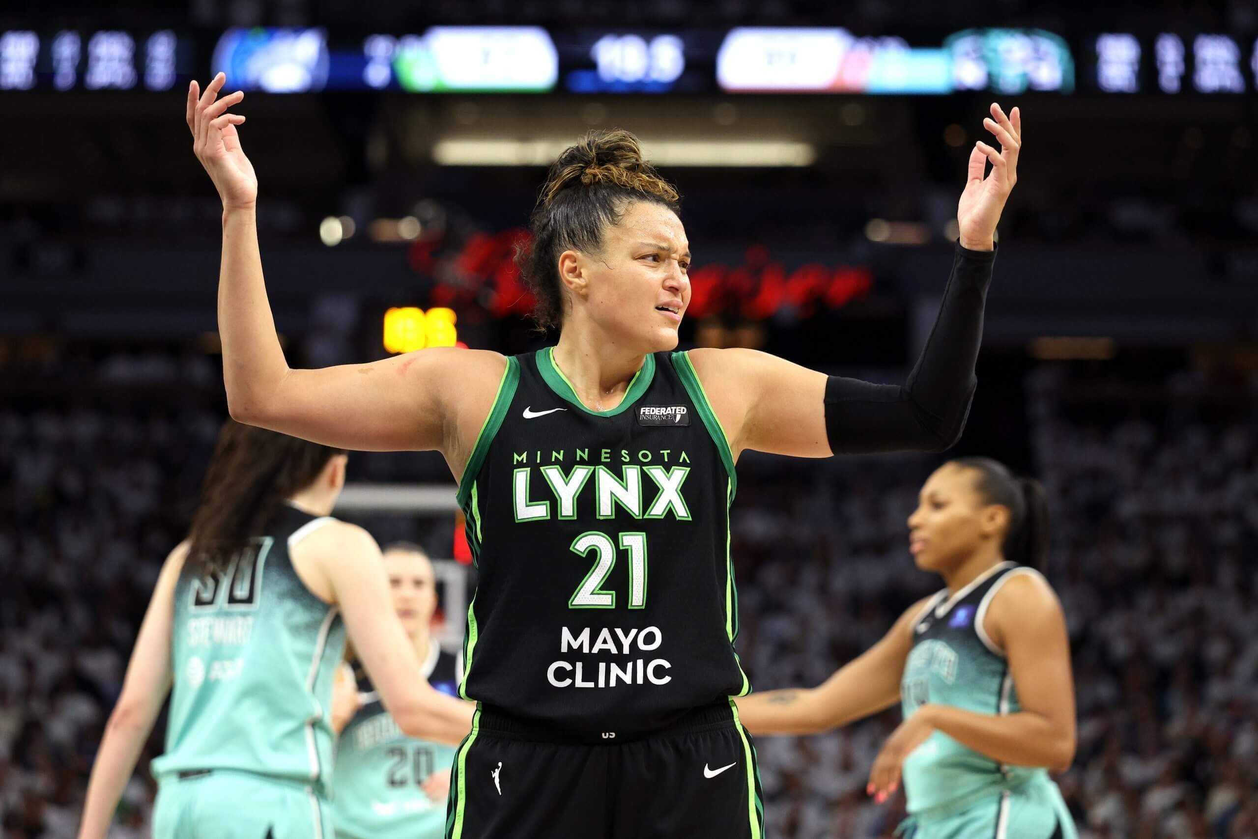 Minnesota Lynx forward Kayla McBride reacts to a play against the Liberty.