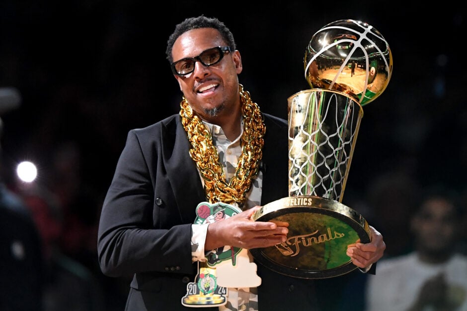 Former Boston Celtics, Paul Pierce, holds the Larry O'Brien Championship Trophy during the NBA Championship Ring ceremony prior to the game against the New York Knicks at TD Garden.