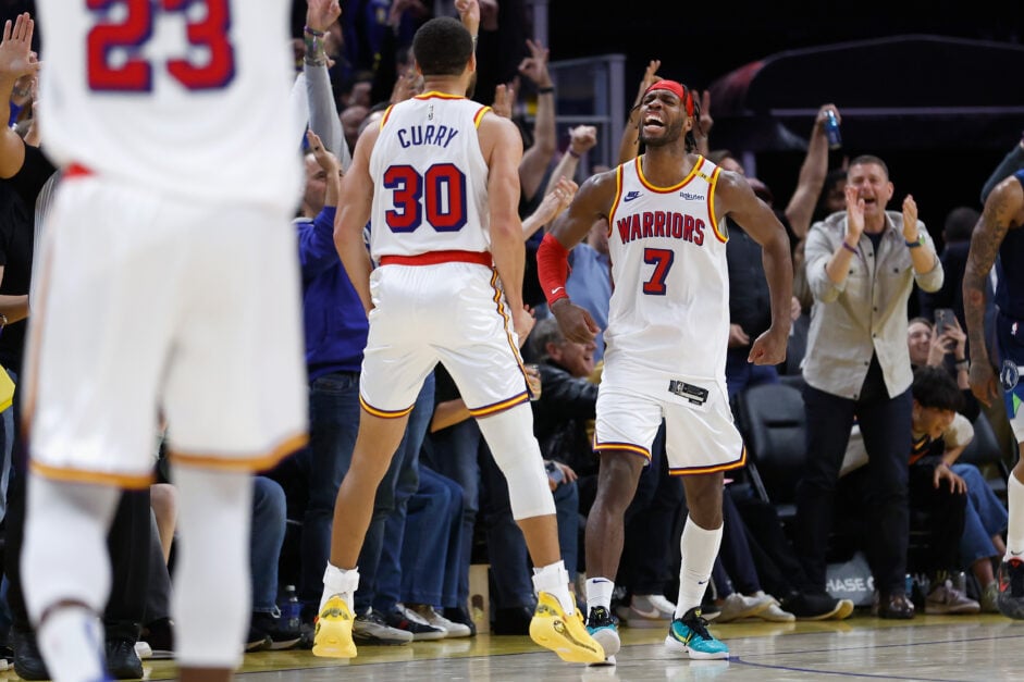 Buddy Hield and Stephen Curry doing a celebration.