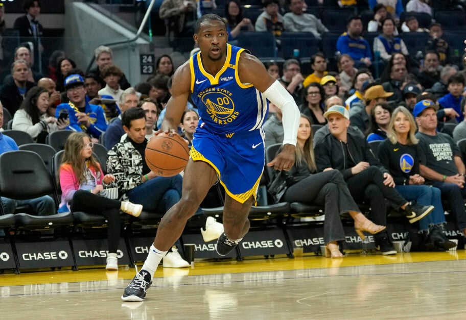 Jonathan Kuminga dribbles the ball for Golden State