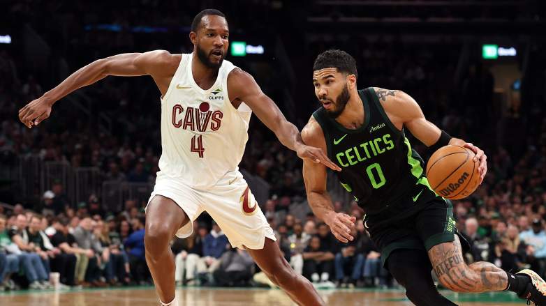 Boston Celtics forward Jayson Tatum drives past Cleveland Cavaliers center Evan Mobley