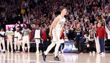 DENVER, COLORADO - MARCH 07: Christian Braun #0 of the Denver Nuggets celebrates after a three poin...