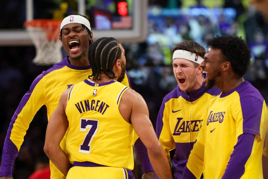 Gabe Vincent #7 of the Los Angeles Lakers reacts to his shot with Jarred Vanderbilt #2, Austin Reaves #15, and Bronny James #9 in the second half against the New York Knicks at Crypto.com Arena on March 06, 2025 in Los Angeles, California.