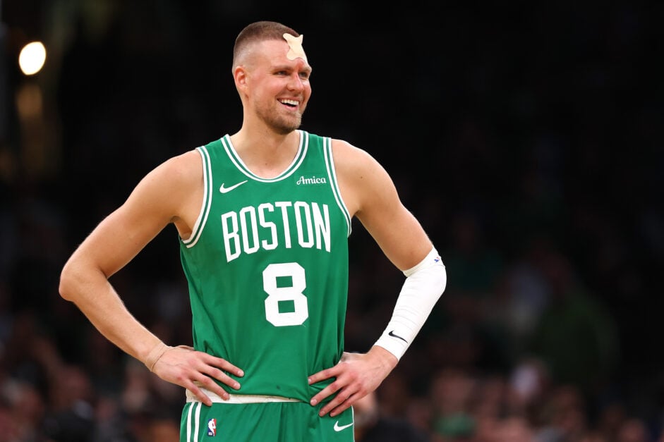 Kristaps Porzingis #8 of the Boston Celtics reacts with a bandage on his head against the Orlando Magic during the third quarter in Game Two of the Eastern Conference First Round NBA Playoffs at TD Garden.