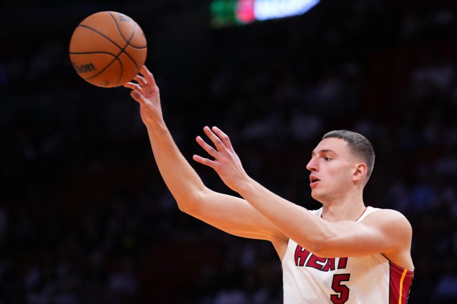 Nikola Jovic #5 of the Miami Heat throws a pass against the Cleveland Cavaliers during the fourth quarter in Game Three of the Eastern Conference First Round NBA Playoffs at Kaseya Center.