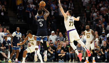 MINNEAPOLIS, MINNESOTA - APRIL 27: Anthony Edwards #5 of the Minnesota Timberwolves shoots the ball against Luka Doncic #77 of the Los Angeles Lakers in the fourth quarter of Game Four of the First Round of the 2025 NBA Playoffs at Target Center on April 27, 2025 in Minneapolis, Minnesota. The Timberwolves defeated the Lakers 116-113 to take a 3-1 series lead. NOTE TO USER: User expressly acknowledges and agrees that, by downloading and or using this photograph, User is consenting to the terms and conditions of the Getty Images License Agreement. (Photo by David Berding/Getty Images)