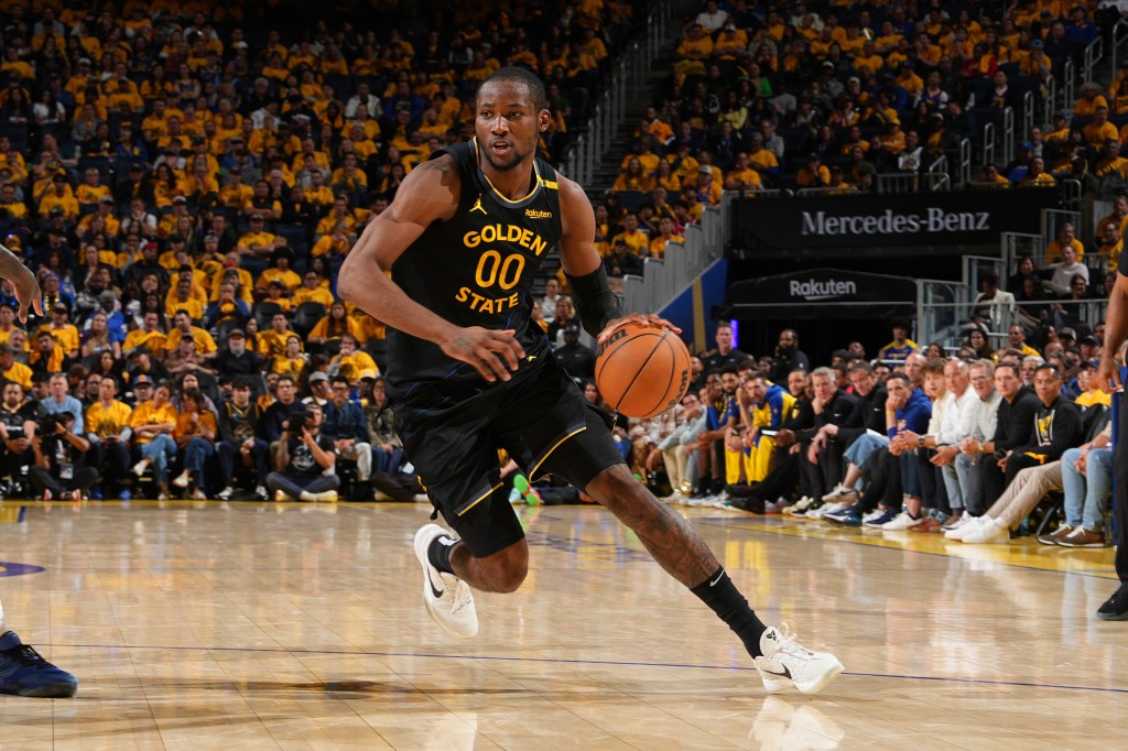 Jonathan Kuminga #00 of the Golden State Warriors dribbles the ball during the game against the Minnesota Timberwolves  during Round 2 Game 4 of the 2025 NBA Playoffs on May 12, 2025 at Chase Center in San Francisco, California.