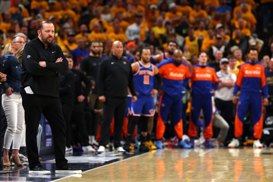 Head coach Tom Thibodeau of the New York Knicks (L) looks on against the Indiana Pacers during the fourth quarter in Game Three of the Eastern Conference Finals of the 2025 NBA Playoffs at Gainbridge Fieldhouse on May 25, 2025 in Indianapolis, Indiana.