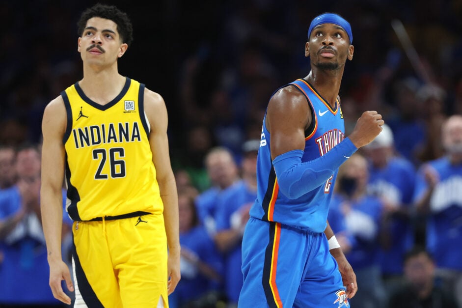 Shai Gilgeous-Alexander #2 of the Oklahoma City Thunder celebrates as Ben Sheppard #26 of the Indiana Pacers looks on during the fourth quarter in Game Seven of the 2025 NBA Finals at Paycom Center.