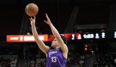 Walt Clayton Jr. #13 of the Utah Jazz shoots...