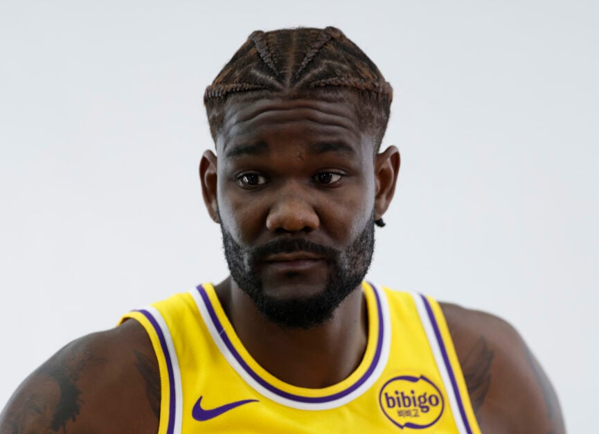 Deandre Ayton poses in Lakers jersey for media day