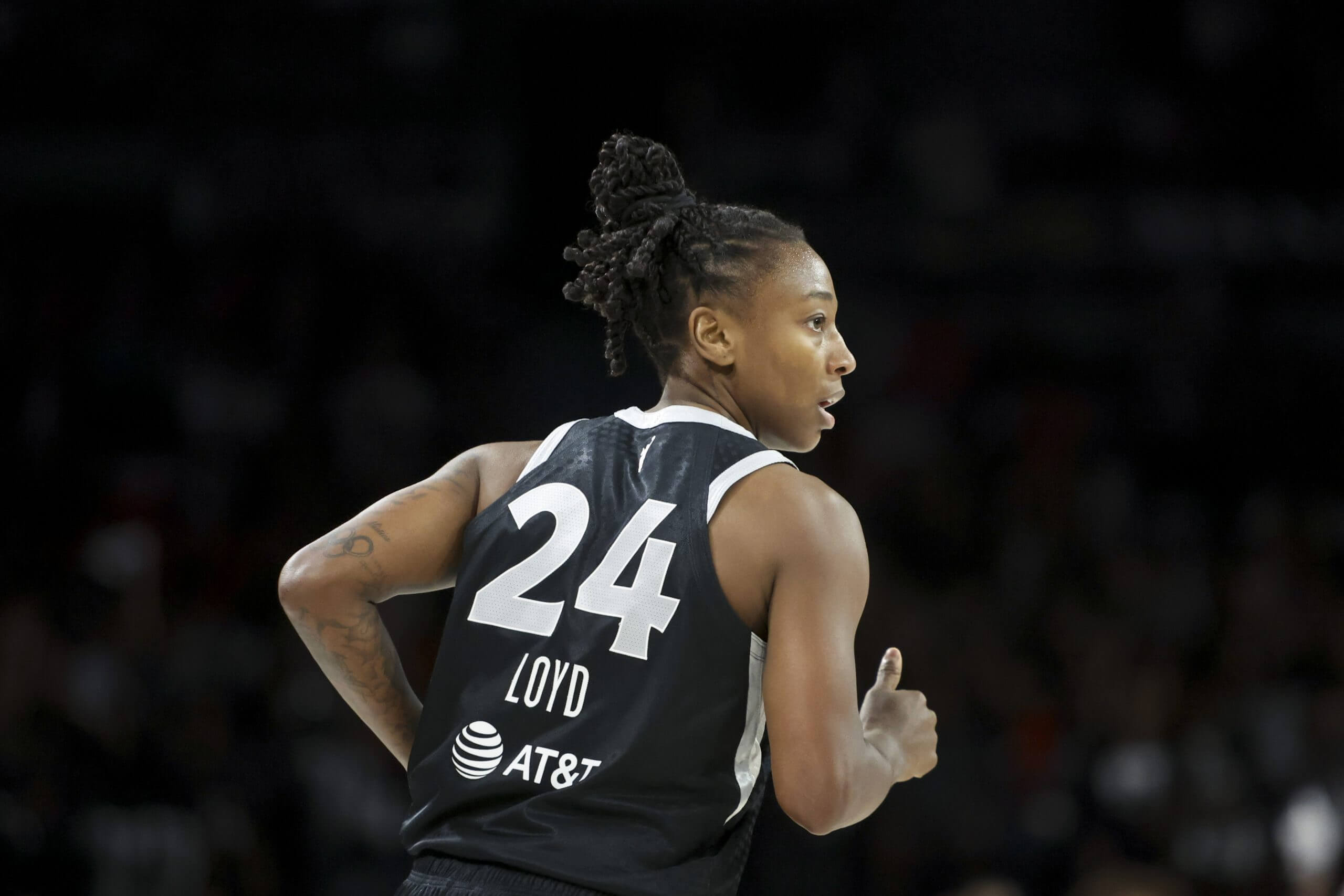 Aces guard Jewell Loyd races down the court in the playoffs.