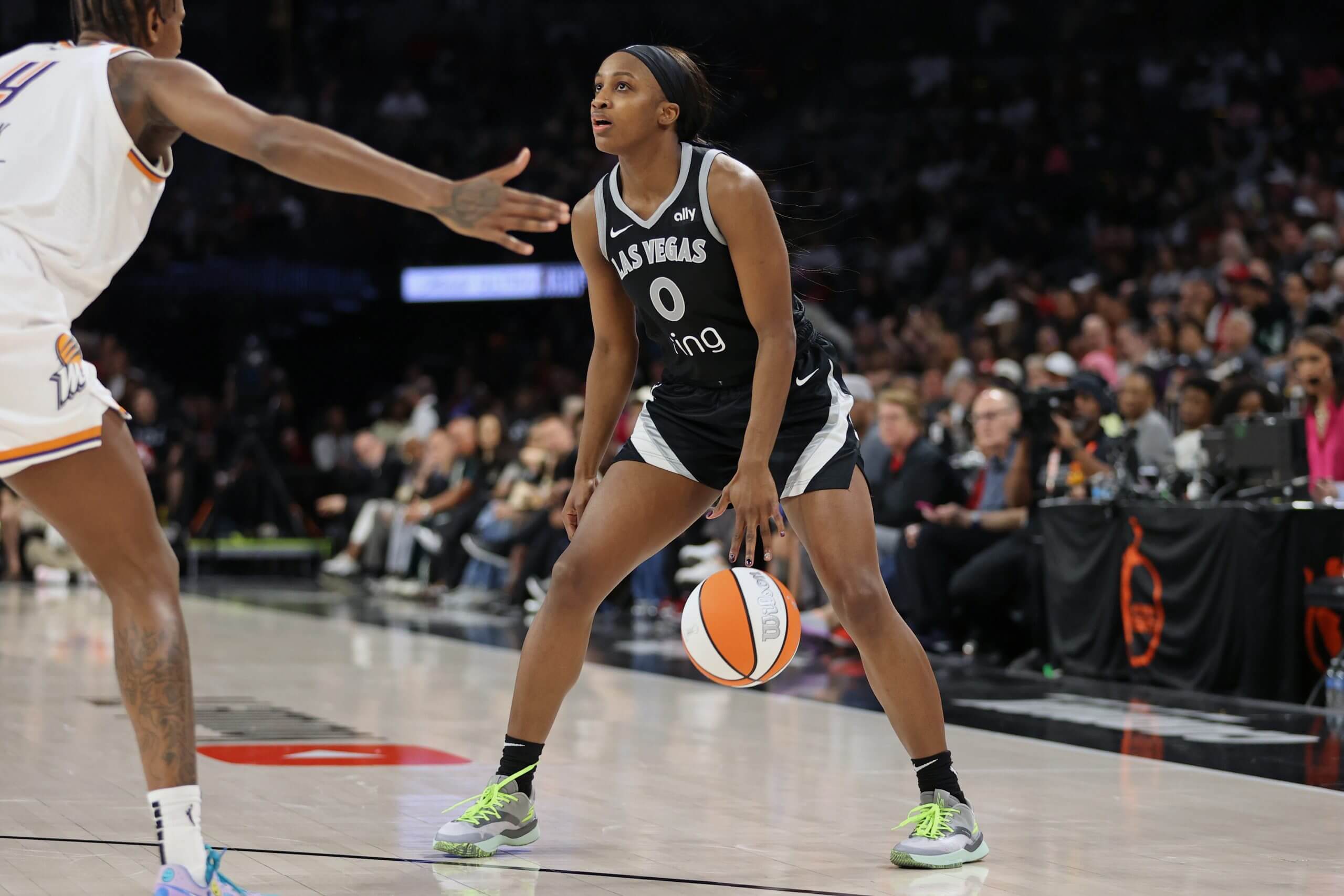 Las Vegas Aces' Jackie Young dribbles in the WNBA Finals.