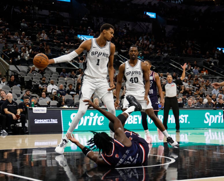 Victor Wembanyama #1 of the San Antonio Spurs grabs a rebound against the Guangzhou Loong-Lions in a pre-season game during the first half at Frost Bank Center on October 6, 2025 in San Antonio.