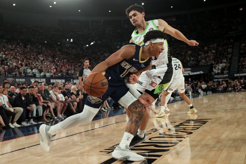 Jeremiah Fears of the Pelicans handles the ball during the NBAxNBL match between South East Melbourne Phoenix and New Orleans Pelicans at Rod Laver Arena.