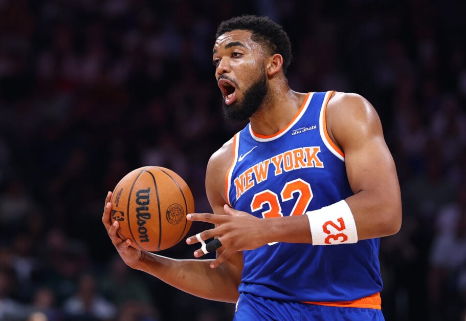 OCTOBER 04: Karl-Anthony Towns #32 of New York Knicks handles the ball during a preseason game between Philadelphia 76ers and New York Knicks.