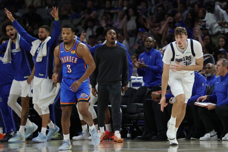 Cooper Flagg #32 of the Dallas Mavericks reacts to a three point shot during the first half of a preseason game against the Oklahoma City Thunder at Dickies Arena.