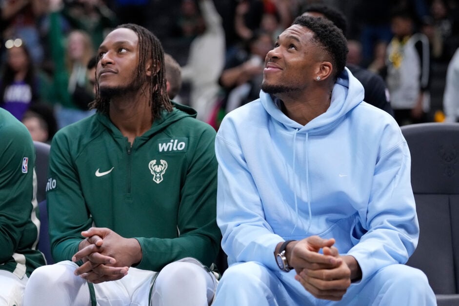 Giannis Antetokounmpo #34 and Myles Turner #3 of the Milwaukee Bucks look on during the second half of preseason game against the Detroit Pistons at Fiserv Forum.