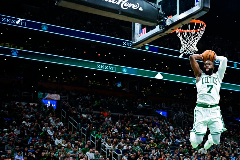 Jaylen Brown #7 of the Boston Celtics dunks the ball during the second quarter of a preseason game against the Cleveland Cavaliers at TD Garden.