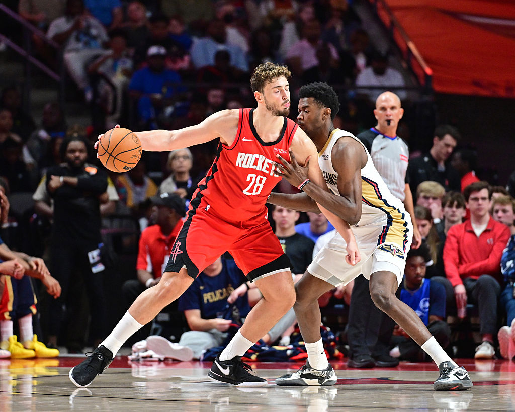 BIRMINGHAM, AL - OCTOBER 14: Alperen Sengun #28 of the Houston Rockets drives to the basket during the game against the New Orleans Pelicans during Preseason on October 14, 2025 at Legacy Arena at the BJCC in Birmingham, Alabama. NOTE TO USER: User expressly acknowledges and agrees that, by downloading and/or using this Photograph, user is consenting to the terms and conditions of the Getty Images License Agreement. Mandatory Copyright Notice: Copyright 2025 NBAE (Photo by Adam Hagy/NBAE via Getty Images)