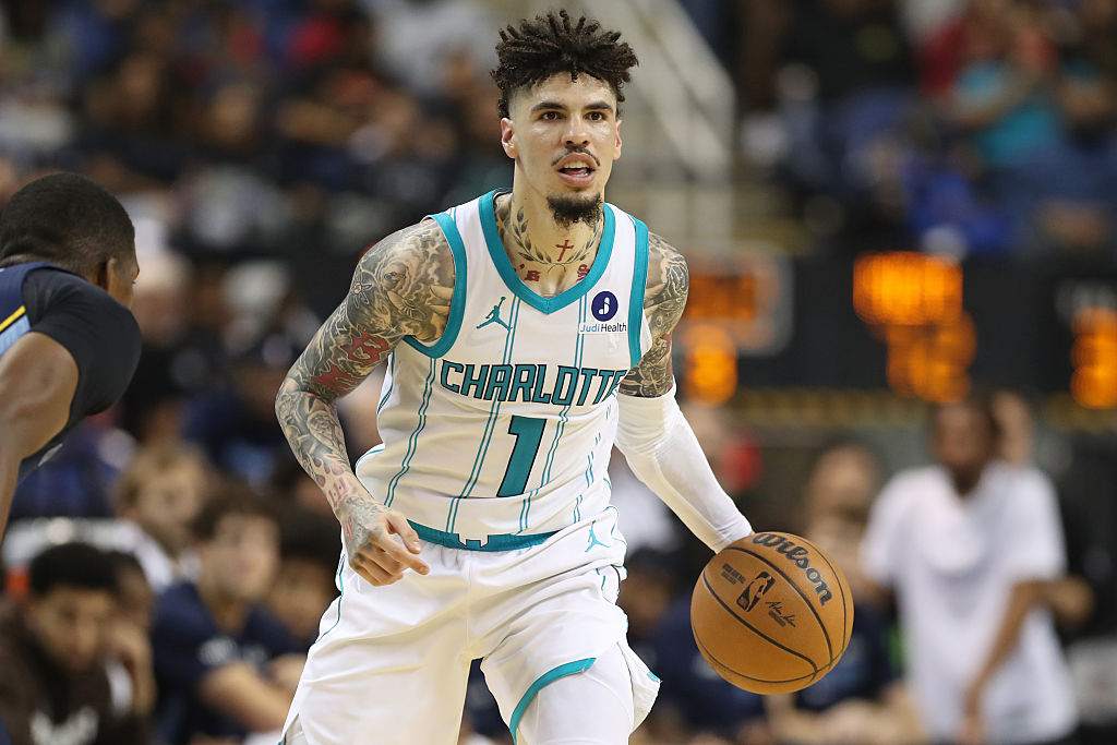 GREENSBORO, NC - OCTOBER 15: LaMelo Ball #1 of the Charlotte Hornets handles the ball during the game against the Memphis Grizzlies during a pre-season game on October 15, 2025 at Greensboro Coliseum, Greensboro, NC.
