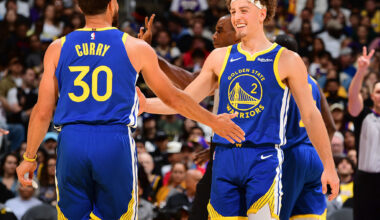 LOS ANGELES, CA - OCTOBER 21: Stephen Curry #30 high fives Brandin Podziemski #2 of the Golden State Warriors during the game against the Los Angeles Lakers on October 21, 2025 at Crypto.Com Arena in Los Angeles, California. NOTE TO USER: User expressly acknowledges and agrees that, by downloading and/or using this Photograph, user is consenting to the terms and conditions of the Getty Images License Agreement. Mandatory Copyright Notice: Copyright 2025 NBAE (Photo by Adam Pantozzi/NBAE via Getty Images)