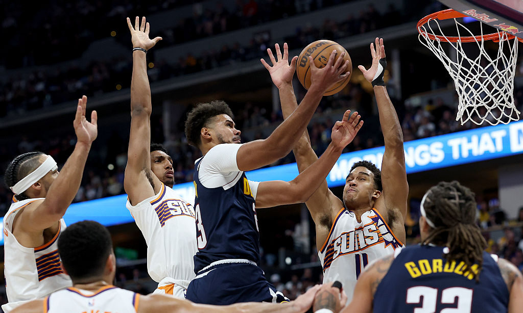 Nuggets pound Suns in home opener, show off complete roster