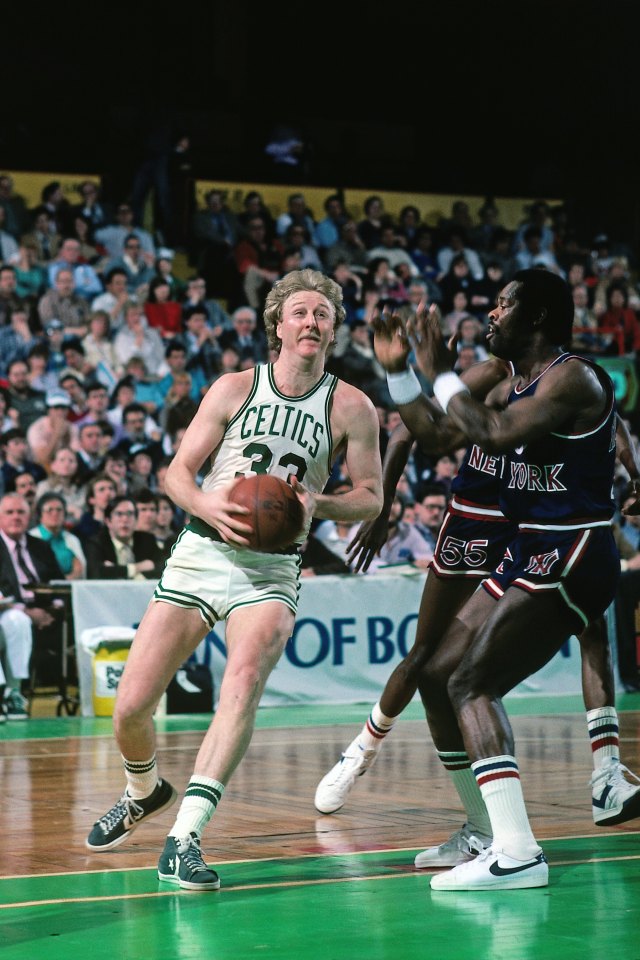 BOSTON - 1983: Larry Bird #33 of the Boston Celtics drives to the basket against the New York Knicks during a game played in 1983 at the Boston Garden in Boston, Massachusetts. NOTE TO USER: User expressly acknowledges and agrees that, by downloading and or using this photograph, User is consenting to the terms and conditions of the Getty Images License Agreement. Mandatory Copyright Notice: Copyright 1983 NBAE (Photo by Dick Raphael/NBAE via Getty Images)