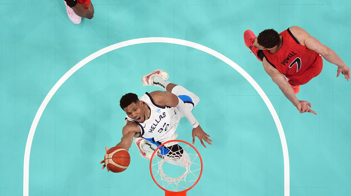 Greece small forward Giannis Antetokounmpo (34) shoots against Canada power forward Dwight Powell (7) in the second half during the Paris 2024 Olympic Summer Games at Stade Pierre-Mauroy.