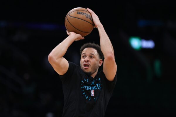Charlotte Hornets guard Seth Curry (30) shoots during warm ups before a game against the Boston Celtics at TD Garden.