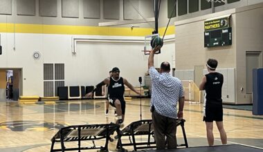 Milwaukee Bucks Rim Rockers visit Raymond School, gym teacher is a member of the squad