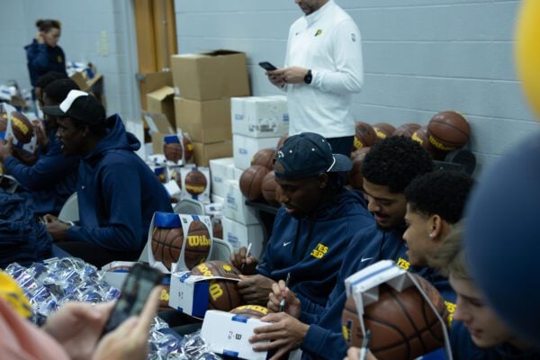 Indiana Pacers players and staff interacting with the community at the event held at Haughville Park in Indianapolis.