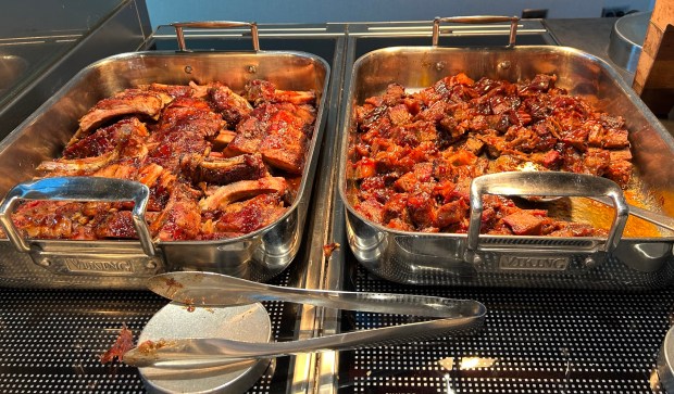 Raspberry chipotle baby back ribs and beef burnt ends are among the new offering from Big Belly Brothers BBQ, one of six new restaurant options  at Ball Arena for the 2025-26 Avalanche and Nuggets seasons. (Lori Punko, The Denver Post)